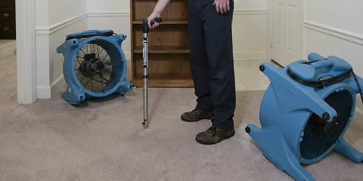 emergency water removal equipment deployed to dry a flooded residential interior in Orange, CA