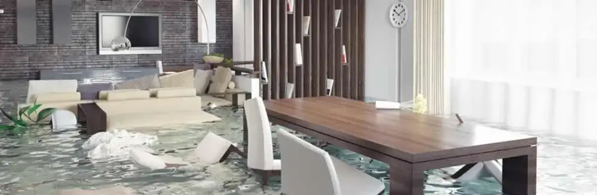 home interior affected by water damage with flooded floors and displaced furniture in Orange, CA
